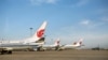 FILE - Air China airplanes are seen at Beijing Capital International Airport, in Beijing, China, June 16, 2020. 