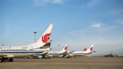 FILE - Pesawat Air China di Bandara Internasional Ibu Kota Beijing, Beijing, China, 16 Juni 2020.