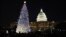 The U.S. Capitol Christmas Tree is pictured against a backdrop of the U.S. Capitol Building in Washington, December 4, 2012. 