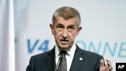 FILE - Czech Prime Minister Andrej Babis speaks during a joint press conference in Budapest, Hungary, June 21, 2018. 