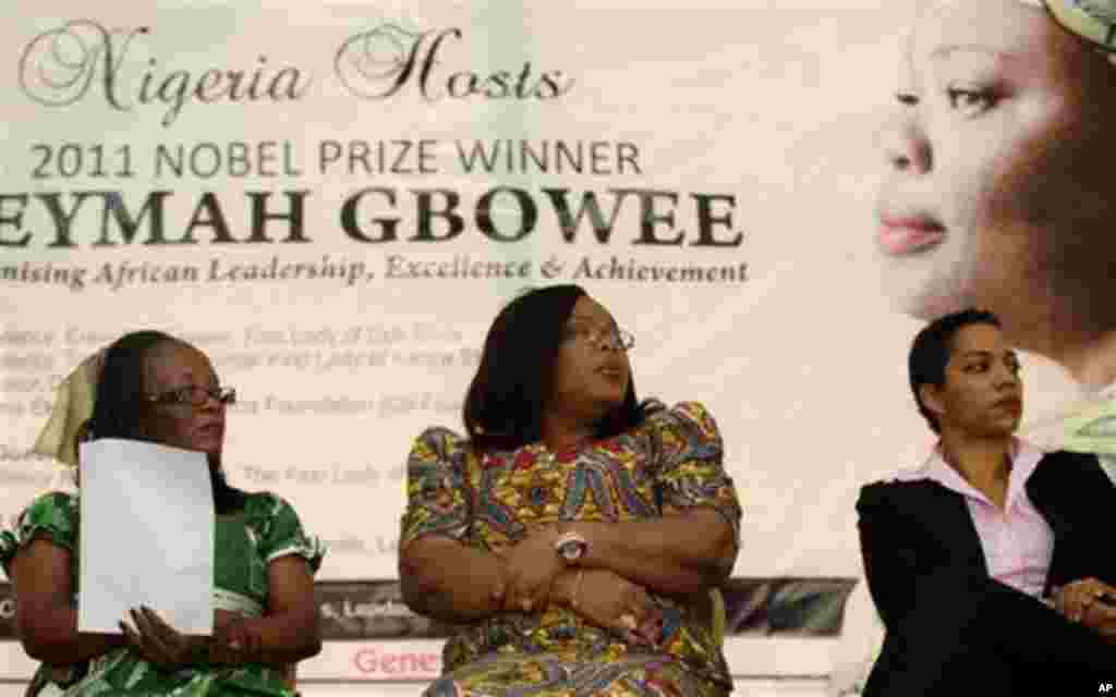 Liberian Minister for Gender and Development Vabah Kazaku Gayflor, left, Nobel laureate Leymah Gbowee, center, and Dr. Ndidi Nnoli Edozien attend a talk during a visit to Lagos, Nigeria, Friday, Dec. 2, 2011. Gbowee warned against "godfatherism" in politi