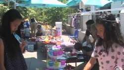 Young Entrepreneurs Learn Money's Value By Selling Old Clothes, Toys