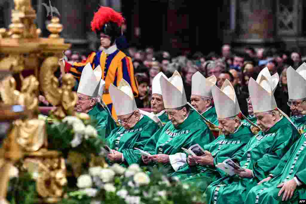 Prelates attend a Pope's Mass to mark the newly established "Sunday of the Word of God" at St. Peter's Basilica in the Vatican, Jan. 26, 2020.