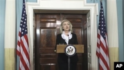 Secretary of State Hillary Clinton makes a statement calling on President Assad of Syria to step aside, Thursday, Aug. 18, 2011, at the State Department in Washington. (AP Photo/Luis M. Alvarez)