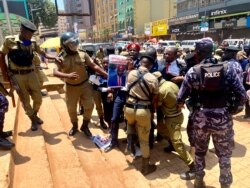 National Unity Platform party President Robert Kyagulanyi, better known as Bobi Wine, was being arrested at the Constitutional square after a street protest against abductions and torture, March 15, 2021. (Halima Athumani/VOA)