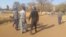 Police arresting some political activists. (Courtesy photo: Zimbabwe Lawyers for Human Rights)