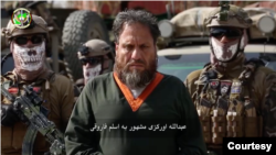 FILE - Abdullah Orakzai, a Pakistani national also known as Aslam Farooqi, the regional chief of the Islamic State group is seen in a photo relased by the Afghan spy agency NDS. (Courtesy - NDS)