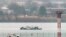 Search efforts are seen around a wreckage site of a deadly midair collision between an American Airlines jet and an Army helicopter, in the Potomac River near Ronald Reagan Washington National Airport, Jan. 31, 2025, in Arlington, Va