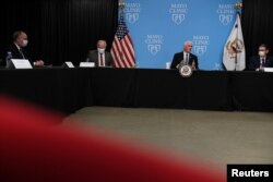 Vice President Mike Pence, 2nd right, hosts a roundtable meeting as he tours Mayo Clinic facilities supporting coronavirus disease (COVID-19) research and treatment, in Rochester, Minnesota, April 28, 2020.