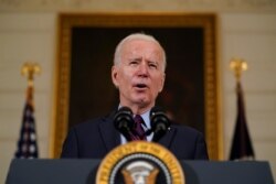 President Joe Biden speaks about the economy in the State Dinning Room of the White House, Feb. 5, 2021, in Washington.