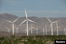 FILE - Power-generating Siemens 2.37 megawatt (MW) wind turbines are seen at the Ocotillo Wind Energy Facility in California, May 29, 2020.