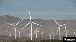 FILE - Power-generating Siemens 2.37 megawatt (MW) wind turbines are seen at the Ocotillo Wind Energy Facility in California, May 29, 2020. 