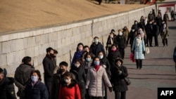 지난해 12월 북한 평양의 시민들.