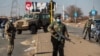 Soldiers patrol outside a shopping mall in Vosloorus, east of in Johannesburg, South Africa, July 14, 2021.