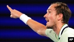 Daniil Medvedev gestures as he argues with chair umpire Jaume Campistol during a break in his semifinal against Stefanos Tsitsipas at the Australian Open tennis championships in Melbourne, Australia, Jan. 28, 2022. 
