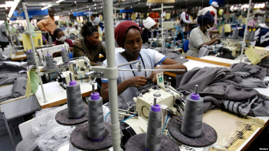 FILE - Kenyan workers prepare clothes for export at a factory in Athi River, near the Kenyan capital, Nairobi, July 31, 2009. 