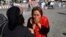 An Afghan woman weeps at the site of a suicide attack in Kabul, Afghanistan, July 23, 2016. 