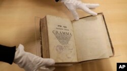 The book titled 'Mikne Avram - Peculium Abrae' is displayed at the Jewish Museum in Prague, Czech Republic, Jan. 16, 2018. 