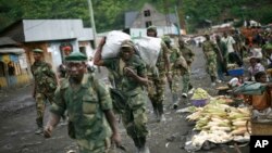 Pemberontak M23 mengungsi dari wilayah Masisi dan Sake, sekitar 27 kilometer sebelah Barat Goma, Kongo, 30 November 2012 (Foto: dok).