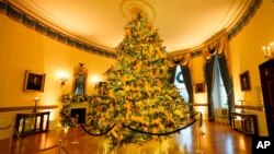 The Blue Room of the White House is decorated during the 2020 Christmas preview, Nov. 30, 2020, in Washington.