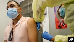 FILE: Representative illustration of a man receiving monkeypox vaccine. Taken Friday, August 19, 2022.