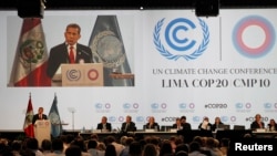 Peru's President Ollanta Humala delivers a speech during the U.N. climate change talks in Lima, Dec. 11, 2014. 