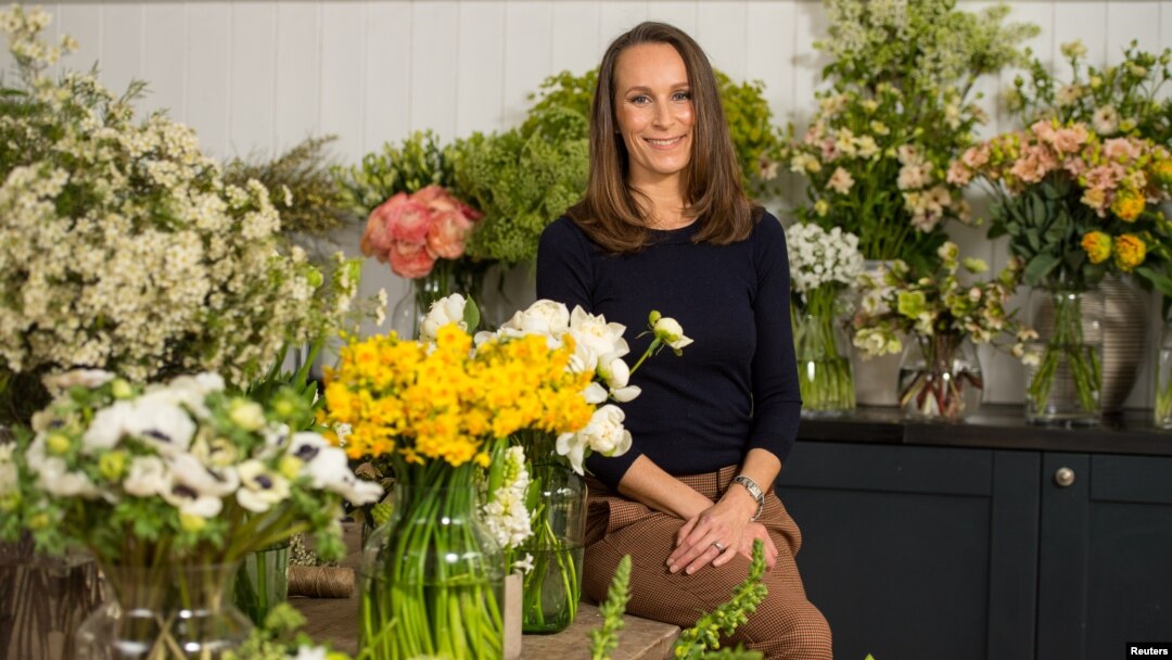 Florist Philippa Craddock, who has been chosen to create the floral displays for the wedding of Prince Harry and Meghan Markle, poses for a photograph in her studio in London, March 29, 2018.
