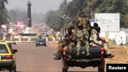 Central African Soldiers patrol a street in Bangui, Central African Republic, January 1, 2013.