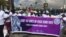 Women demonstrators, including Members of the Kenya Association of Breastfeeding Mothers, hold a protest march in Nairobi, Kenya, May 15, 2018, against a restaurant that allegedly asked a breastfeeding mother to 'Cover up or breastfeed in the toilet."
