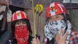 Протести під дощем у Токіо.