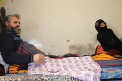 Deeb Zara'a, paralyzed from the waist down after being hit by shrapnel in a battle with IS militants, is pictured in Raqqa, Syria, Feb. 22, 2020. (Heather Murdock/VOA)