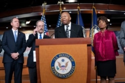 House Oversight and Reform Committee Chairman Elijah E. Cummings, D-Md., center, is joined from left by Intelligence Committee Chairman Adam B. Schiff, D-Calif., Foreign Affairs Committee Chairman Eliot L. Engel, D-N.Y. and Maxine Waters D-Calif.