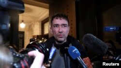 Sebastien Courtoy, lawyer of Mehdi Nemmouche, talks to reporters after the trial of Nemmouche and Nacer Bendrer, who were charged with shooting four people at Brussels' Jewish Museum in 2014, Brussels' Palace of Justice, Belgium, March 7, 2019.