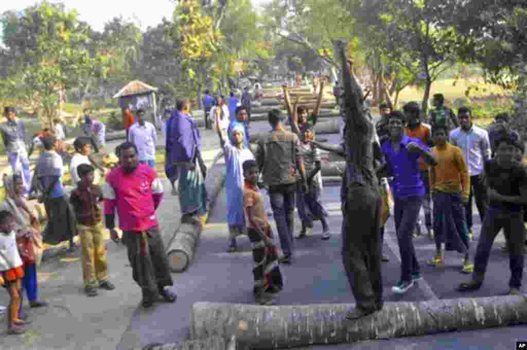 Activists of Jamaat-e-Islami, Bangladesh's largest Islamic party, block traffic during a nationwide strike called by them in Rajshahi, Bangladesh, Sunday, March 3, 2013. Authorities deployed soldiers in a northern Bangladeshi district on Sunday after Isla