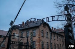 The gate with "Arbeit macht frei" ("Work sets you free") written across it is pictured at the Auschwitz-Birkenau German Nazi death camp during events marking the 79th anniversary of the liberation of Auschwitz-Birkenau camp in Oswiecim, Poland, on Jan. 27, 2024.
