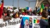 Malians demonstrate against France and in support of Russia in Bamako. A banner in French reads "Putin -- the road to the future." September 22, 2020. (AP Photo)