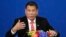 FILE - Philippine President Rodrigo Duterte delivers a speech during the Philippines-China Trade and Investment Forum at the Great Hall of the People in Beijing, Oct. 20, 2016. 