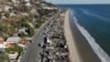 FILE - An aerial view shows the devastation from the Palisades Fire on beachfront homes in Malibu, California, Jan. 15, 2025.