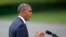 President Barack Obama talks about his administration's response to a growing insurgency foothold in Iraq, June 13, 2014, on the South Lawn of the White House.