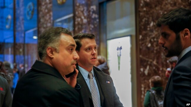 In this Dec. 12, 2016 photo, Los Angeles venture capitalist Imaad Zuberi, far left, arrives at Trump Tower in New York. Zuberi agreed this month to plead guilty to making illegal campaign contributions on behalf of foreign nationals and concealing…