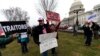 Activists gather on the East Front of the Capitol after the impeachment acquittal of President Donald Trump, on Capitol Hill, Feb. 5, 2020 in Washington.