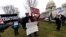 Activists gather on the East Front of the Capitol after the impeachment acquittal of President Donald Trump, on Capitol Hill, Feb. 5, 2020 in Washington.