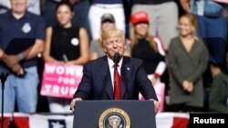 U.S. President Donald Trump speaks during a rally at the U.S. Cellular Center in Cedar Rapids, Iowa, June 21, 2017. 