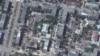 تصویری ماهواره‌ای از ساختمان‌های آسیب‌دیده در اطراف بیمارستانی در سیویرودونتسک، اوکراین. ۶ ژوئن ٢٠٢٢