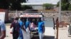 MSF medical staff transfer burn patients out of Drouillard hospital in Haiti after gang violence. (Photo: Avra Fialas/MSF) 