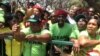 FILE: Zanu-PF supporters outside parliament during the official opening ceremony