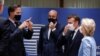 Left to right, Dutch Prime Minister Mark Rutte, European Council President Charles Michel, French President Emmanuel Macron and President of the European Commission Ursula von der Leyen chat at a European Union summit in Brussels, Belgium, July 21, 2020.