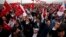 Supporters of Devlet Bahceli, the leader of the Nationalist Movement Party (MHP), chant slogans as he addresses a rally ahead of the Nov. 1 general elections, in Istanbul, Oct. 18, 2015.