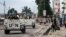 Peacekeepers serving in the United Nations Organization Stabilization Mission in the Democratic Republic of the Congo (MONUSCO) patrol in their armored personnel carrier during demonstrations against Congolese President Joseph Kabila in the streets of the
