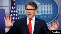 FILE - U.S. Energy Secretary Rick Perry speaks to reporters during a briefing at the White House in Washington.